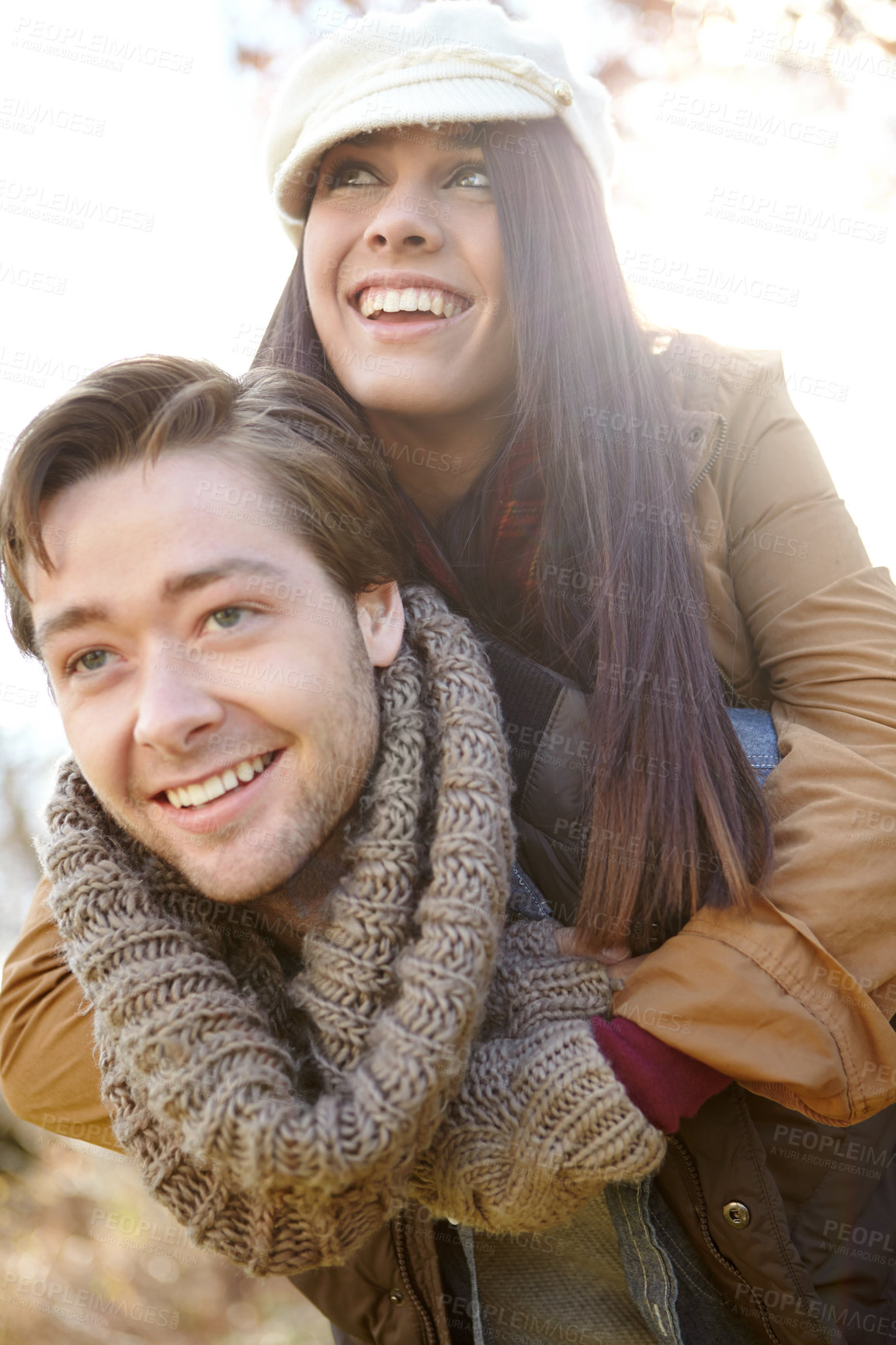 Buy stock photo People, couple and happy in outdoor with piggyback for bonding, support and trust in Germany. Love, relationship and smile in forest or woods for holiday, sightseeing and adventure in winter