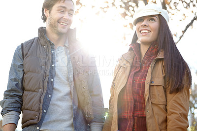 Buy stock photo Woman, man and walk with nature for forest trip, bonding and travel in winter countryside. Smile, love and happy couple holding hands for morning holiday, vacation or woods park or hiking adventure