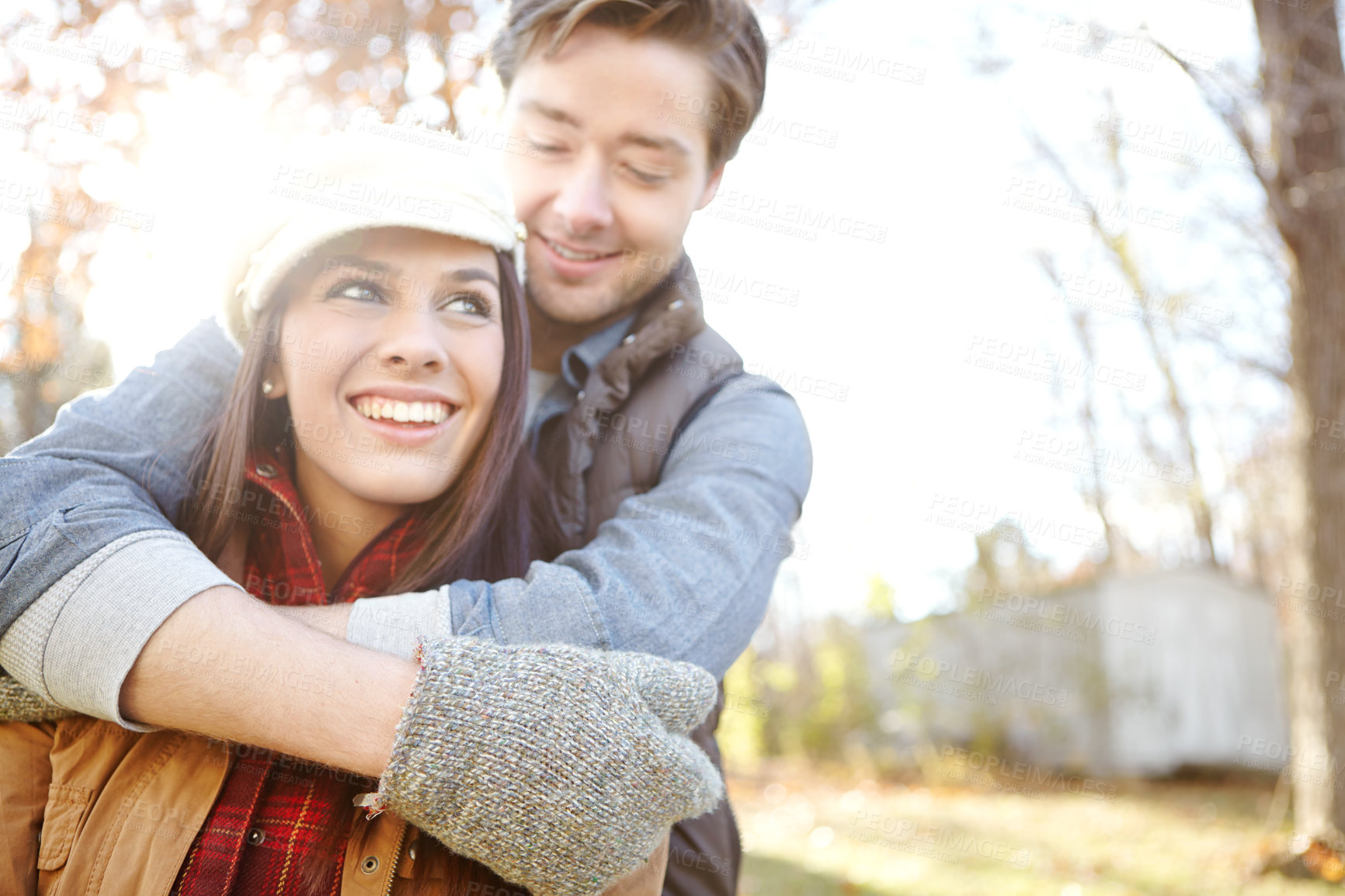 Buy stock photo Happy couple, support and hug on nature date for romance, bonding and outdoor park for commitment. People, woods and holiday to relax in winter season for love, marriage and embrace for security