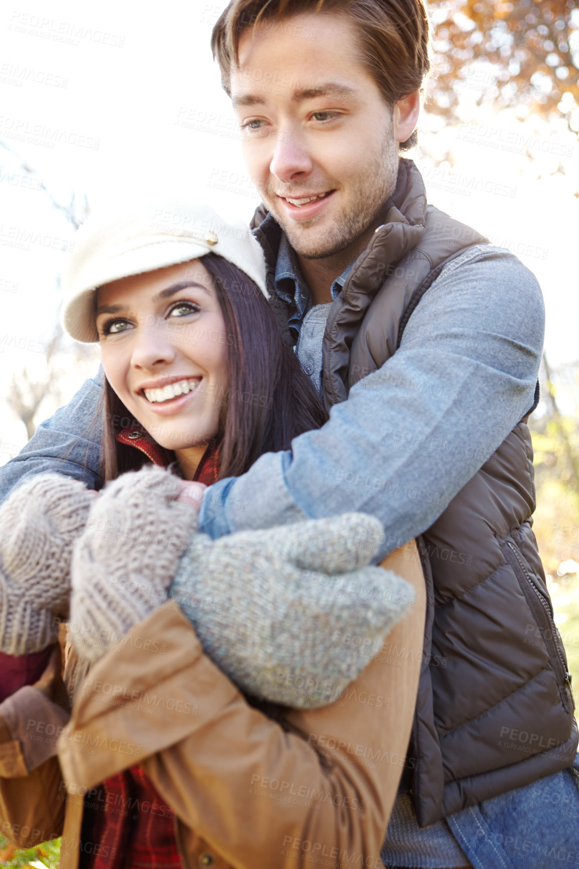 Buy stock photo Happy couple, forest and hug on nature date for romance, bonding and outdoor park for commitment. People, woods and holiday to relax in winter season for love, marriage and embrace for security