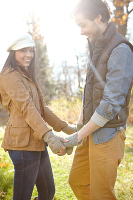 Buy stock photo Couple, holding hands and smile with nature for forest trip, bonding and travel in winter countryside. Man, woman and love together for morning holiday, vacation or woods picnic or hiking adventure