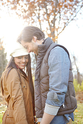 Buy stock photo Happy, hugging and couple in nature for winter vacation, getaway or holiday together for anniversary. Smile, love and young man and woman embracing with care at romance date on weekend trip in Russia