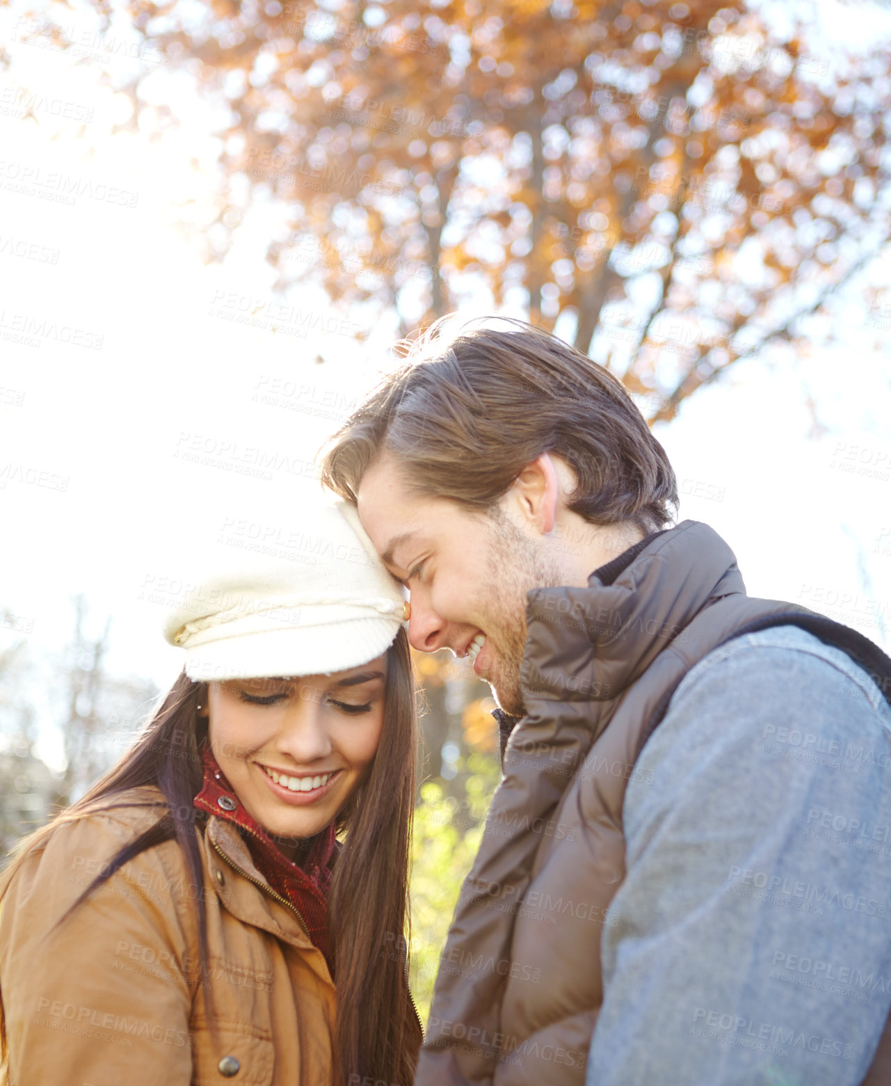 Buy stock photo Romance, love and couple in nature for winter vacation, getaway or holiday together for anniversary. Happy, connection and young man and woman embracing with care at date on weekend trip in Russia