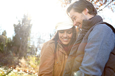 Buy stock photo Smile, couple and love with hug in forest for outdoor adventure, break and happy in morning. Man, woman and romance with affection in sunshine for weekend, anniversary or camp together in New Zealand