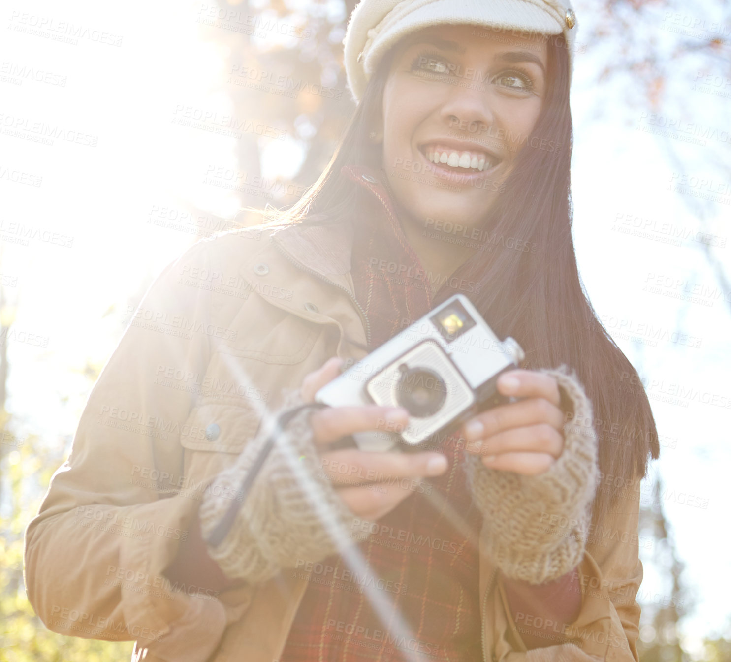 Buy stock photo Woman, happy and camera for photography outdoor with adventure travel, explore nature and sightseeing memory. Smile, female photographer with vintage equipment for scenery of location picture