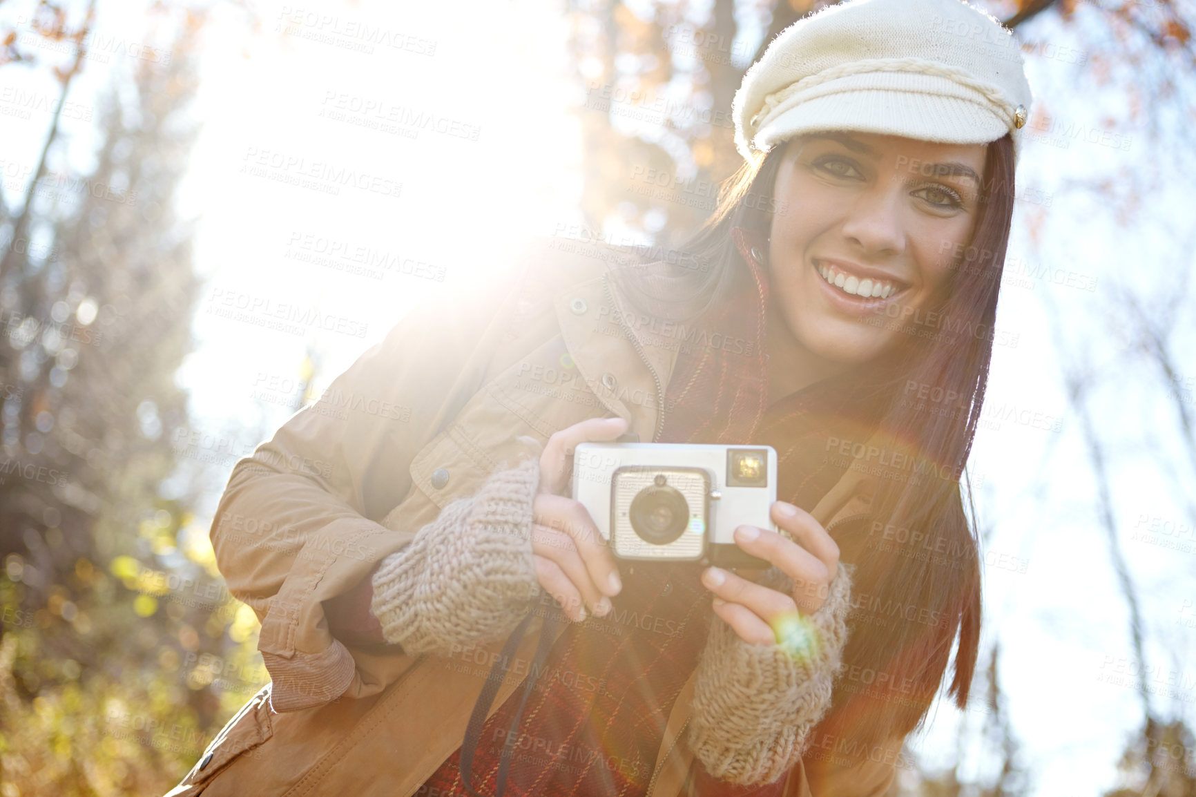 Buy stock photo Woman, camera and portrait for photography outdoor with adventure travel, explore nature and sightseeing memory. Smile, female photographer with vintage equipment for scenery of picture location