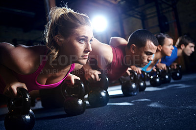 Buy stock photo Fitness, push up and group of people with dumbbells, support and commitment to body workout. Bodybuilder, men and women together in exercise class with kettlebell, power training and teamwork in gym