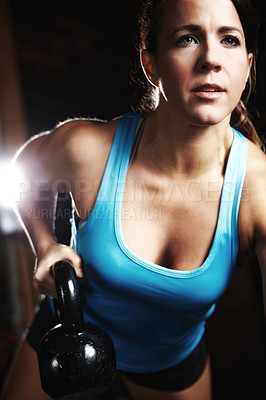 Buy stock photo Woman, athlete and kettlebell in pushups, weight training and exercise for health, strong muscle or wellness. Female person, sport and gym for fitness center, cardio or bodybuilder in workout routine