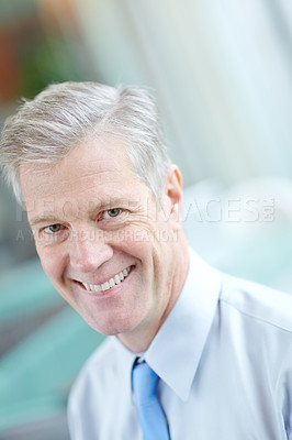 Buy stock photo Mature businessman, face and smile in office for professional career, confidence and growth. Portrait, happy and company manager with pride for work mission, executive job and corporate boss