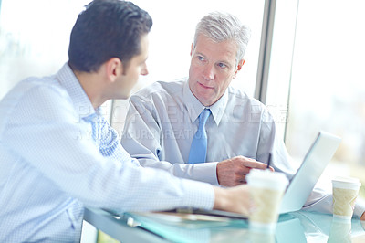 Buy stock photo Business, men and discussion at office with laptop on teamwork or collaboration as accountants. Boardroom, employees and strategy for report or feedback on company financial statement and planning