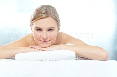 Buy stock photo Massage, portrait of woman and spa customer on bed with studio background for pamper or relax. Face, treatment and wellness with happy person on table in salon as client for natural stress relief