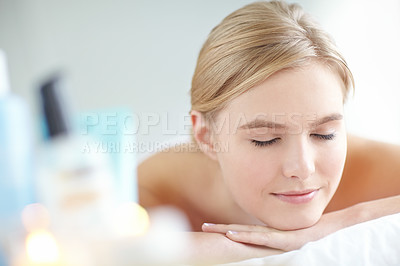 Buy stock photo Face, massage and relax with woman at spa as customer on table for break, treatment or wellness. Luxury, pamper and satisfaction with person on bed as salon client for comfort or stress relief