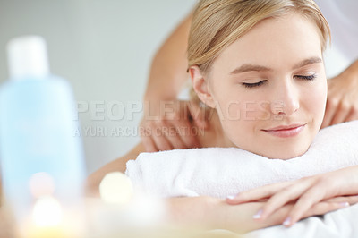 Buy stock photo Beauty, massage and relax with woman at spa as customer on table for break, treatment or wellness. Luxury, pamper and satisfaction with face of person on bed in salon for comfort or stress relief