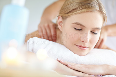 Buy stock photo Massage, pamper and relax with face of woman at spa as customer on table for break, treatment or wellness. Eyes closed, luxury and peace with person on bed of salon for comfort or stress relief