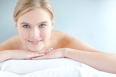 Buy stock photo Massage, relax and spa with portrait of woman customer on table for break, treatment or wellness. Luxury, peace and satisfaction with person on white background in salon for comfort or stress relief