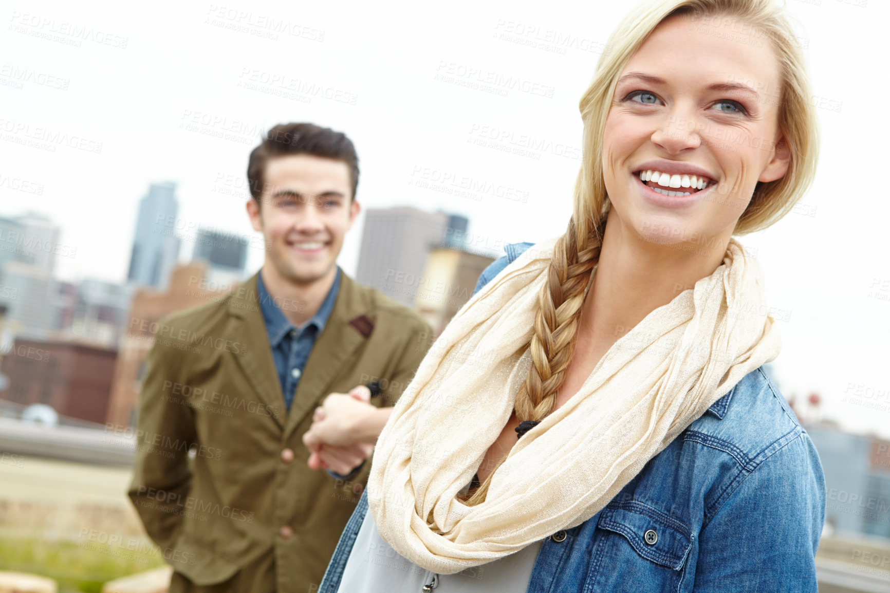 Buy stock photo Holding hands, leading and smile with couple in city together, walking outdoor for date or bonding. Love, park or thinking with happy girlfriend and boyfriend in urban town for romance or tourism