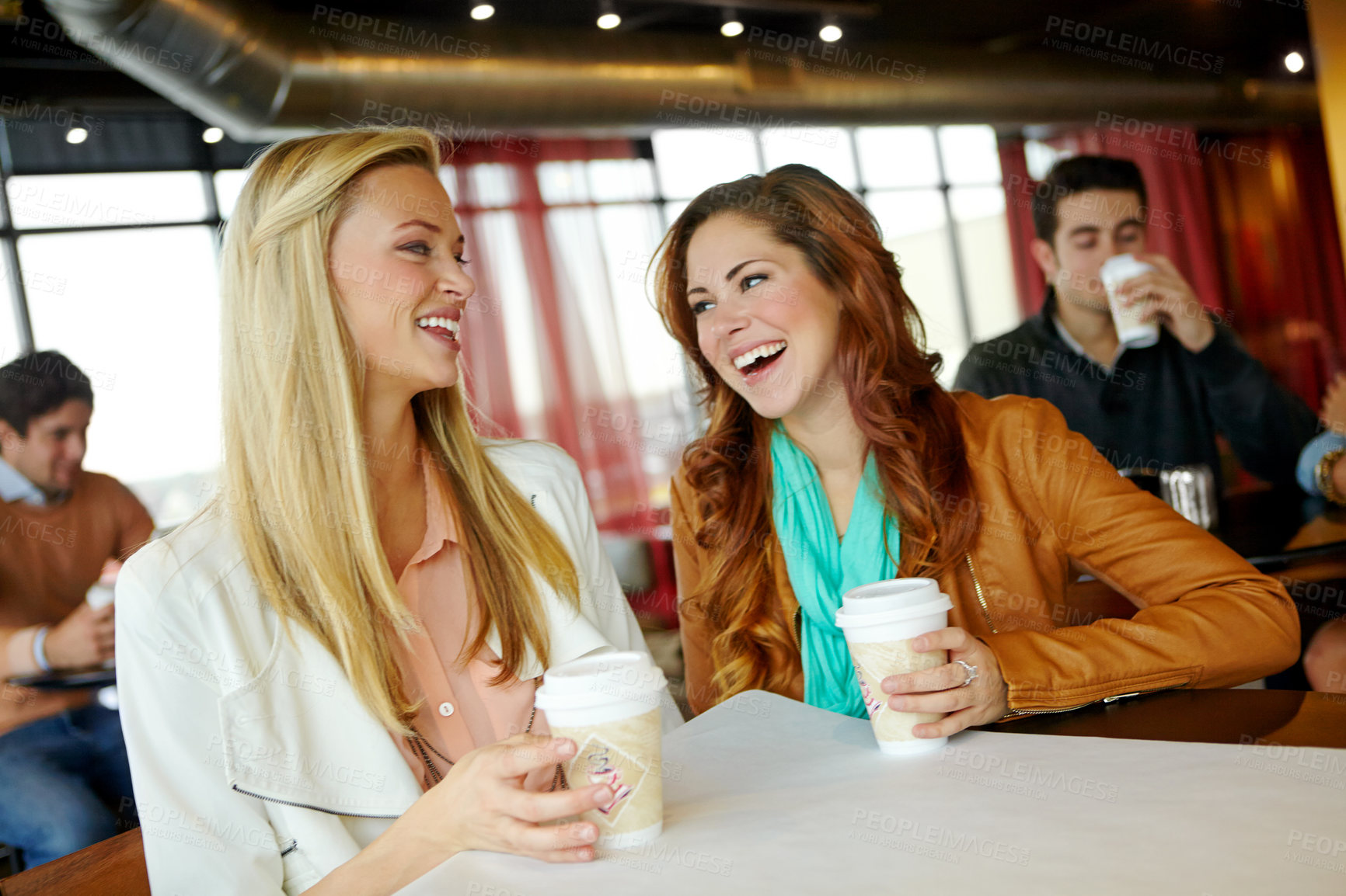 Buy stock photo Funny, laughing or girl friends at coffee shop to relax for humor, reunion or morning chat together. Women, joke or happy people bonding at cafe, diner or restaurant for drinking cappuccino beverage