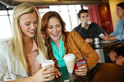 Buy stock photo Phone, girl or friends in coffee shop on social media, blog post or online web in restaurant together. Reunion, mobile app or people drinking beverage on break in cafe for chat, news or gossip story