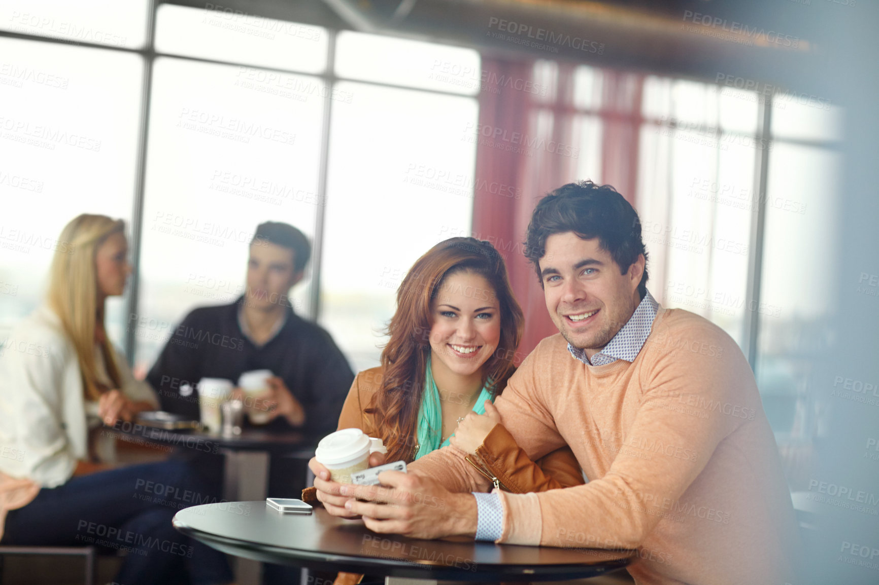 Buy stock photo Portrait, happy couple and date in cafe with drink in restaurant together. Face, man and woman smile at coffee shop to embrace partner for love, relationship or pay for morning latte with credit card