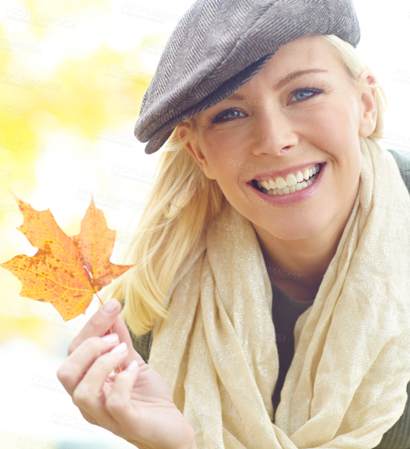 Buy stock photo Autumn, smile and woman with leaf in portrait for outdoor holiday, environment and colorful nature. Female person, happy and adventure with foliage in park for travel, peace and vacation in Canada