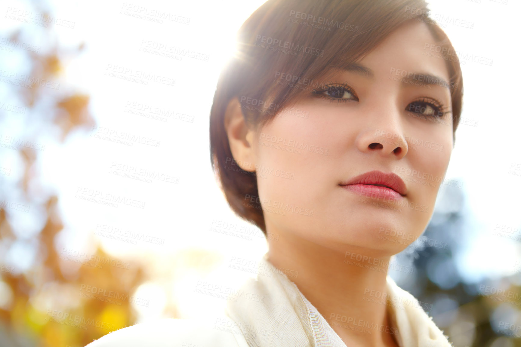 Buy stock photo Japanese woman, portrait and sunshine in park with nature, trees and outdoor with confidence on autumn morning. Person, garden and break with connection to environment, relax and silence on holiday