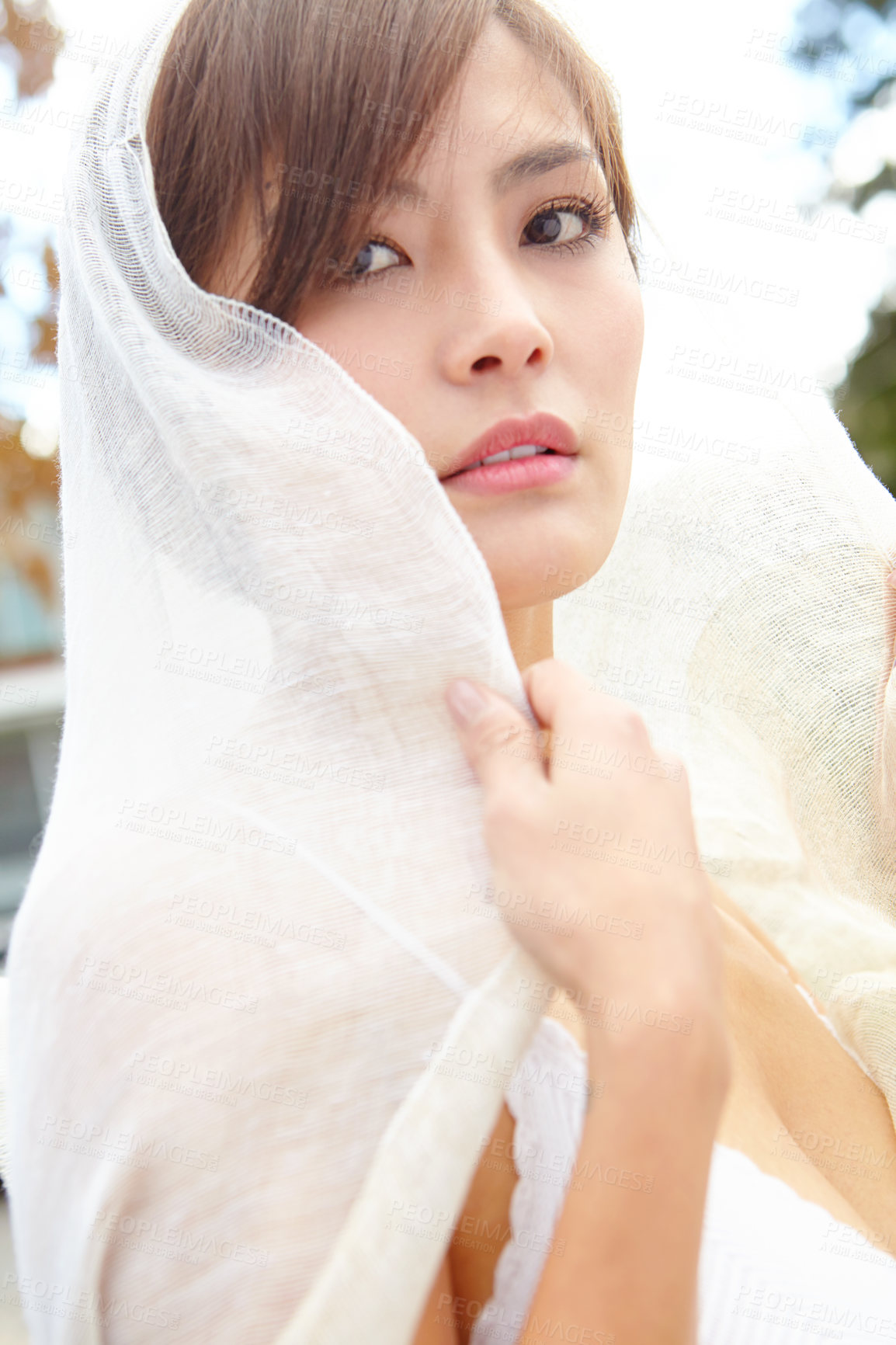 Buy stock photo Wedding, serious and portrait of woman with veil for marriage, celebration and outdoor ceremony. Confident, Asian person and face of bride with makeup for romantic event, beauty and designer dress