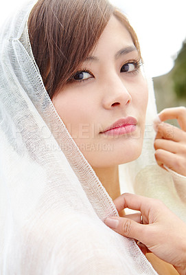 Buy stock photo Confident, woman and portrait with veil at wedding for marriage, ceremony and outdoor celebration. Asian person, beauty and face of bride with makeup for romantic event, pride and designer fabric