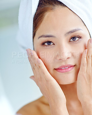 Buy stock photo Beauty, asian woman and portrait with skincare in bathroom for cleaning face, morning routine and self care reflection. Person, smile and cosmetics with facial treatment for glowing skin in house