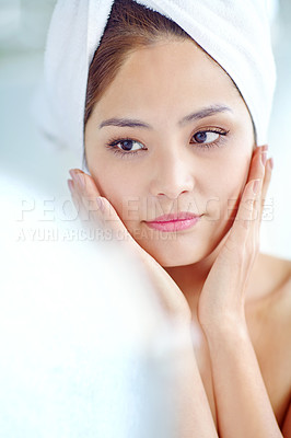 Buy stock photo Beauty, girl and home with skincare in bathroom for cleaning face, morning routine and self care reflection. Korean woman, confidence and cosmetics with facial treatment for glowing skin and wellness