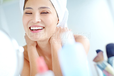 Buy stock photo Asian woman, bathroom and skincare with smile, face or moisturizer bottle for change with health in home. Person, towel and grooming routine for cosmetics, excited and product for beauty in morning