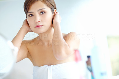 Buy stock photo Portrait, woman and haircare in bathroom in home for hairstyle, morning routine and getting ready with reflection. Korean person, beauty and hair grooming in mirror for personal hygiene and wellness