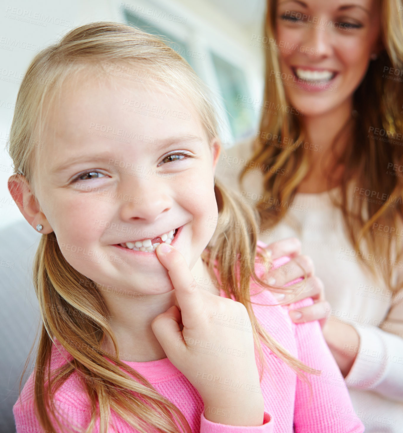 Buy stock photo Portrait, mom and kid with tooth gap, love and bonding together with smile on morning in home. Relax, mother and proud girl child on couch with happy support, growth and dental care in living room