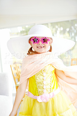 Buy stock photo Fancy, dress and portrait of kid in home with fun, glamour and confidence with sunglasses for character play. Princess, costume and happy girl with smile, fantasy game and creative development.