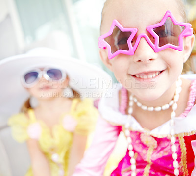 Buy stock photo Two cute little girls wearing dress up clothing and having fun