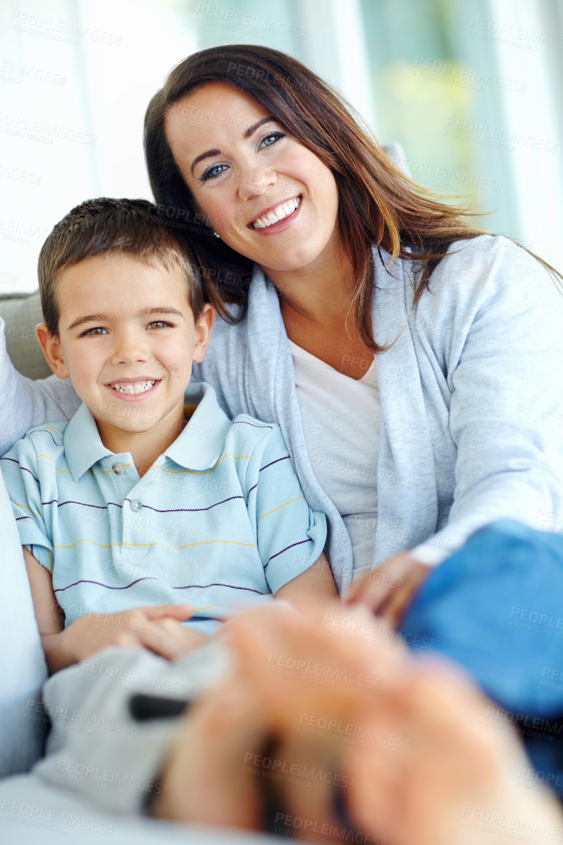 Buy stock photo Mom, child and hug on couch for love, support or care with bonding for happy childhood or weekend together at home. Portrait, mother and kid or son with smile for embrace or relax on living room sofa