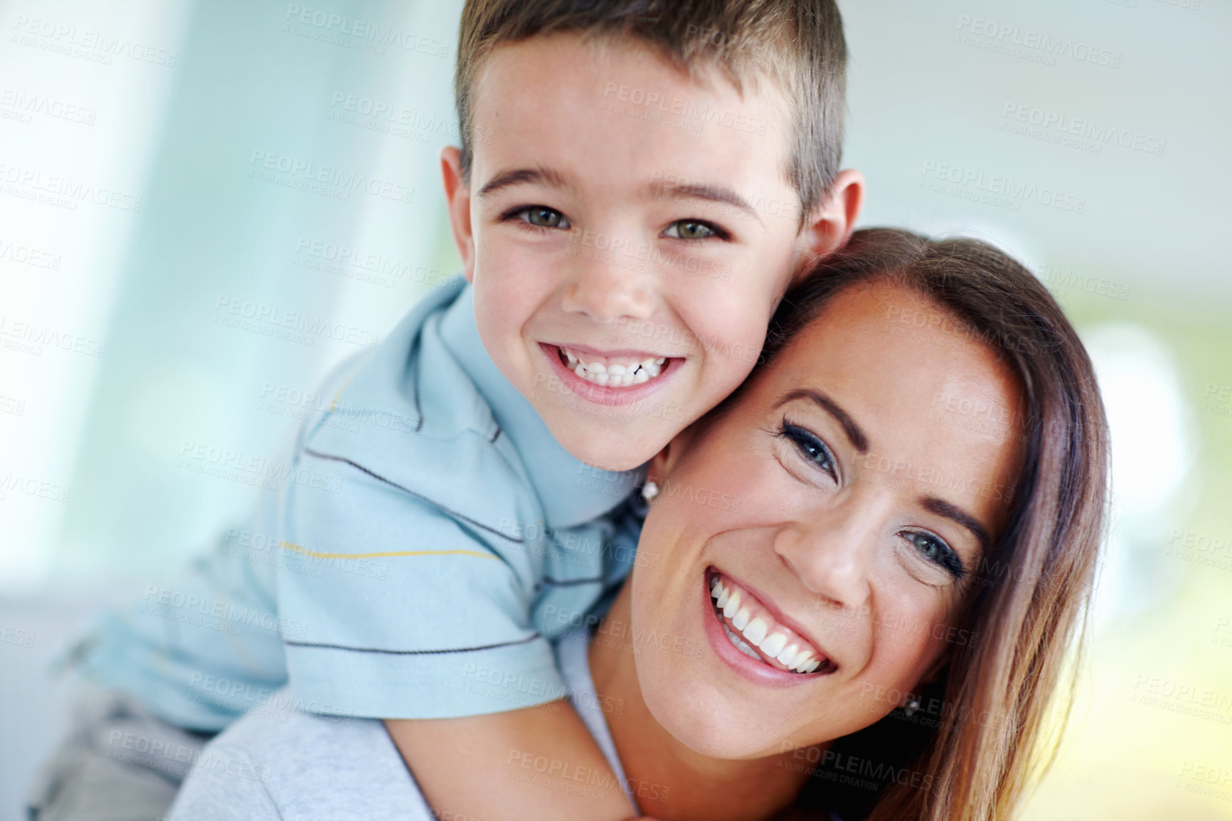 Buy stock photo Mother, child and hug on couch for love, support or care with bonding for happy childhood or weekend together at home. Portrait, mom and kid or son with smile for embrace or relax on living room sofa