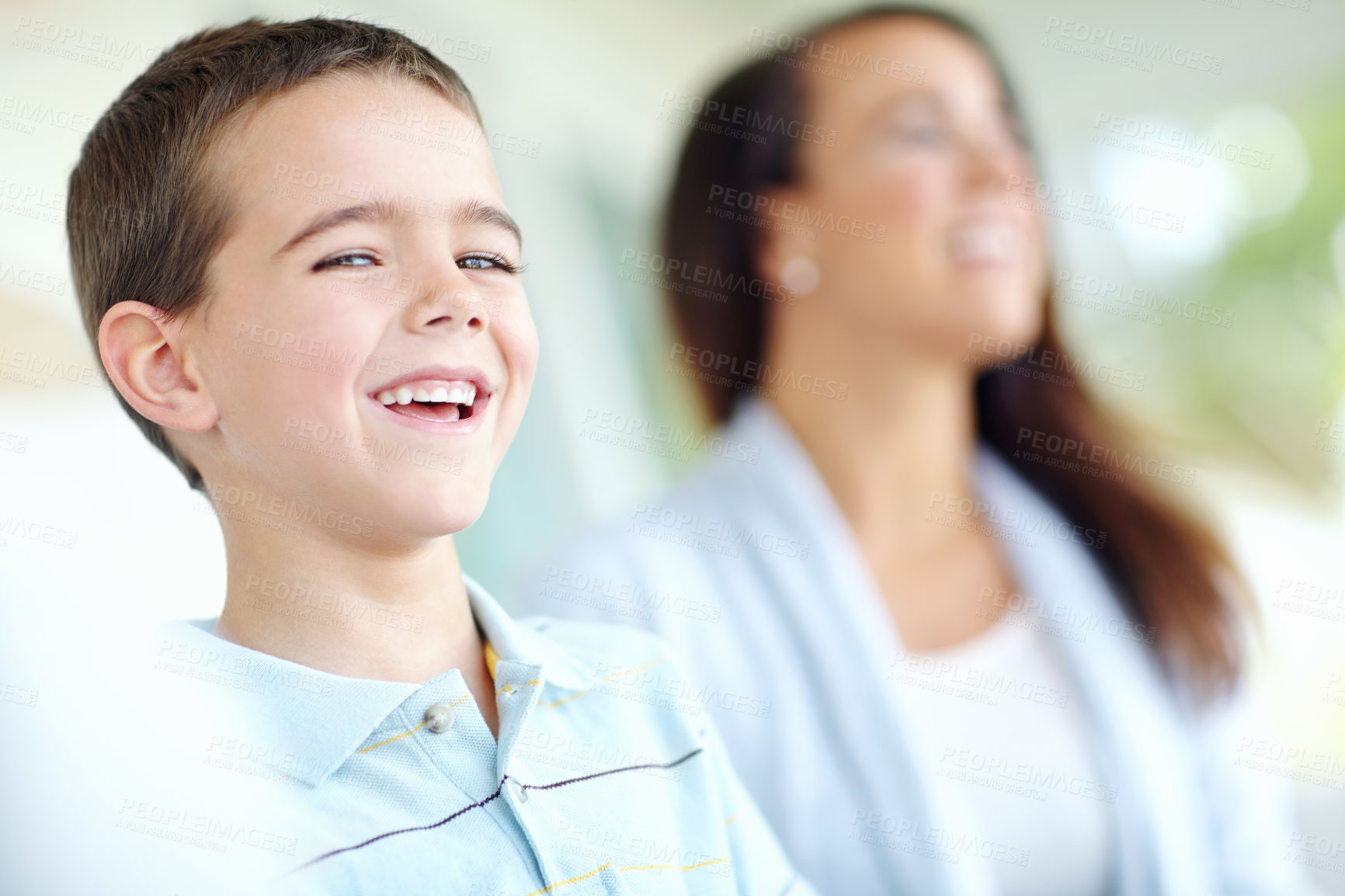Buy stock photo Portrait, laughing and child with mom, boy and together with parent in school meeting and smile. Classroom, kid and woman in conference for student, growth and development of son with education