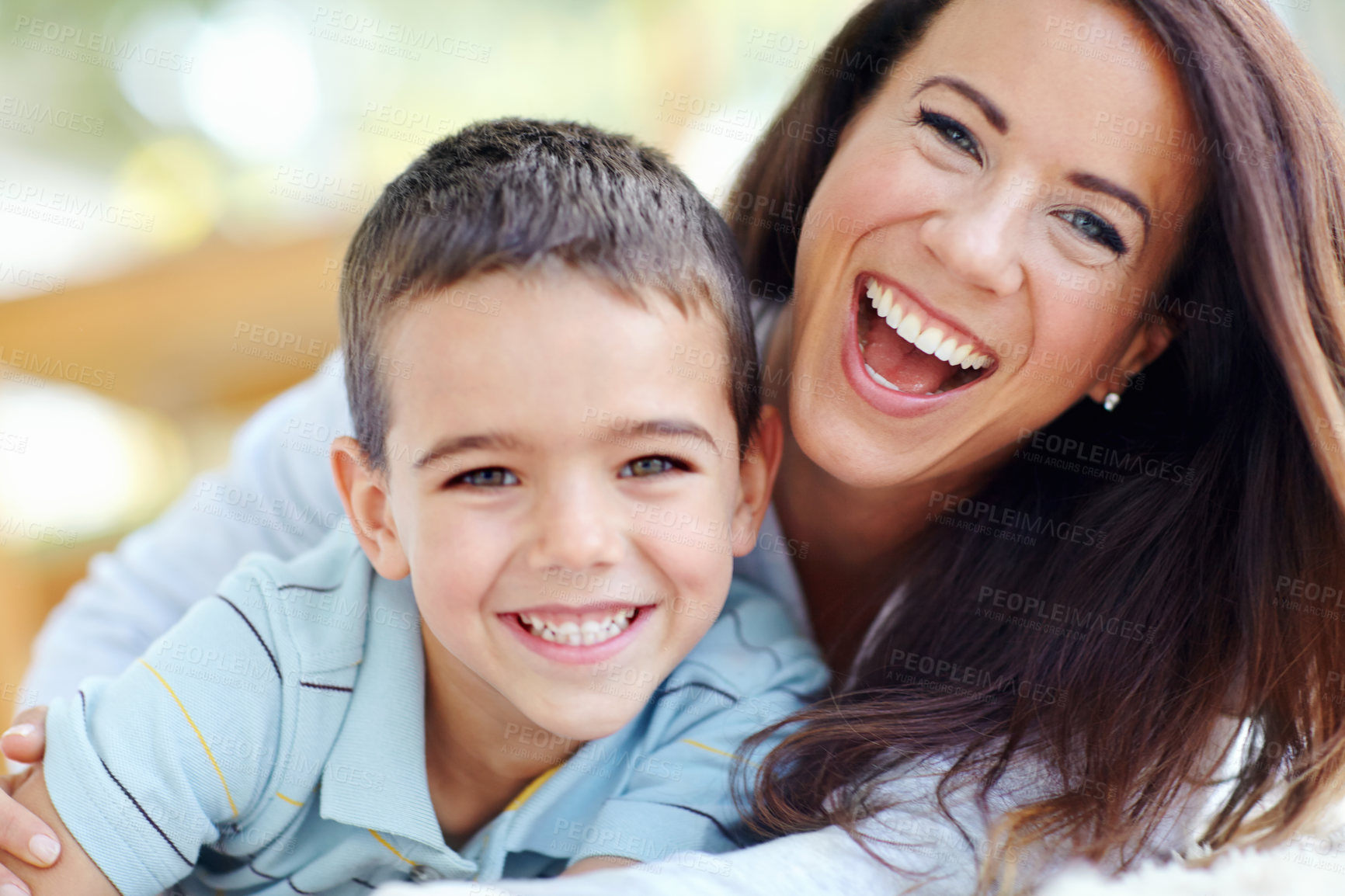 Buy stock photo Mama, child and hug on sofa for love, support or care with bonding for childhood or weekend together at home. Portrait, mother and kid or son with smile for embrace or relax on living room couch