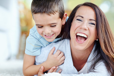 Buy stock photo Mom, child and play on floor for love, support or care with bonding for happy childhood or weekend together at home. Portrait, mother and kid or son with smile for embrace or relax in living room