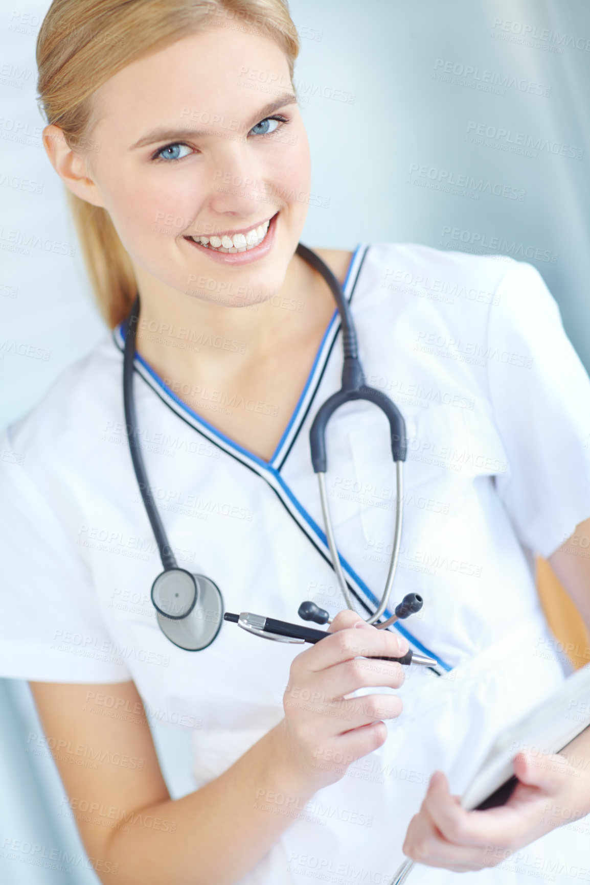 Buy stock photo Portrait, nurse and woman with healthcare, writing and hospital for wellness, documents and career ambition. Face, notebook or medical with professional in uniform, documents or stethoscope in clinic