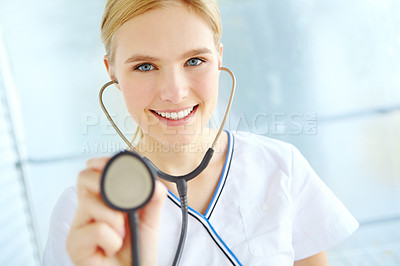 Buy stock photo Portrait, woman or doctor in healthcare with stethoscope, lungs assessment and monitoring health of patient. Medical, female cardiologist and tool to listen for heart sounds, rhythm or blood pressure