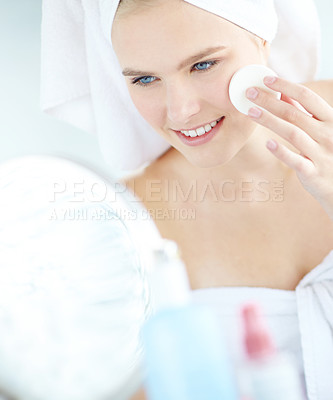 Buy stock photo Happy, woman and cleaning face for skincare with cotton pad, facial hygiene and wipe makeup of dermatology. Girl, product and cosmetic for natural benefits, glow results and beauty mirror at house