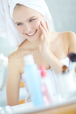 Buy stock photo Smile, woman and skincare in bathroom at house for facial satisfaction, smooth results and cleaning routine. Happy, girl and towel for dermatology treatment, natural beauty and cosmetics of self care