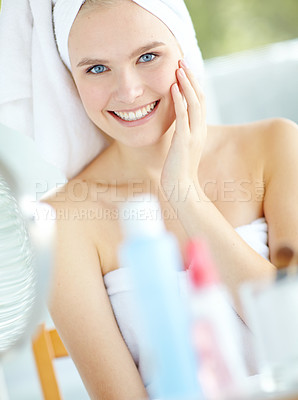 Buy stock photo Portrait, woman and skincare in bathroom at house for facial satisfaction, smooth results and cleaning routine. Happy, girl and towel for dermatology shine, natural beauty and cosmetics of self care