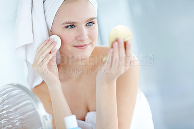 Buy stock photo Bathroom, cotton and woman with mirror for skincare, morning routine or date preparation. Cosmetics, girl or remove makeup with swab for cleaning, hygiene or face treatment for natural beauty in home