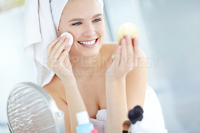 Buy stock photo Bathroom, cotton and happy woman with mirror for skincare, morning routine or dermatology. Cosmetics, girl or remove makeup with pad for cleaning, hygiene or face treatment for natural beauty in home