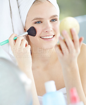 Buy stock photo Makeup, happy and woman with hand mirror in home for facial, beauty and cosmetic treatment. Cosmetology brush, self care and female person getting ready with press powder for smooth skin at house.