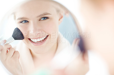 Buy stock photo Girl, beauty and cosmetics with makeup brush, mirror and confidence for dermatology or healthy skin in home. Female person, pride and wellness with smile, glow and results in skincare or cosmetology