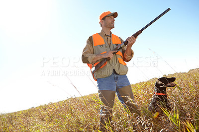 Buy stock photo Man, dog and rifle in outdoor for huntsman, monitor park and search for danger together in nature. Mature person, pet animal and tracking team in field to guide in woods, mockup and stalking game