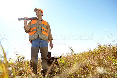 Buy stock photo Man, dog and bush for hunting hobby, shotgun practice and stalking prey together in nature. Mature person, pet animal and hunter support in field to guide on mockup, thinking and outdoor tracking